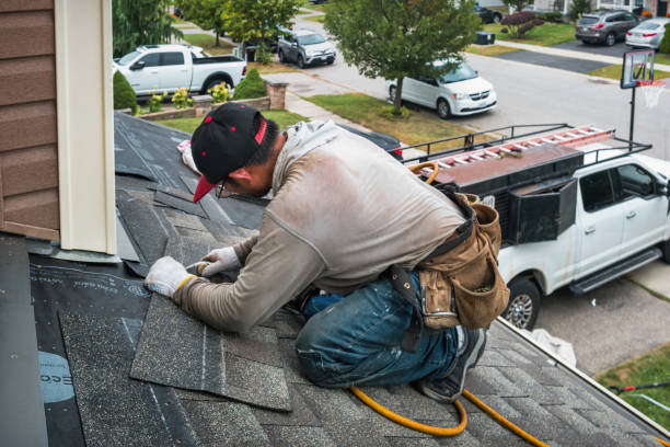 Professional Roof Replacement technician working in Linden, MI
